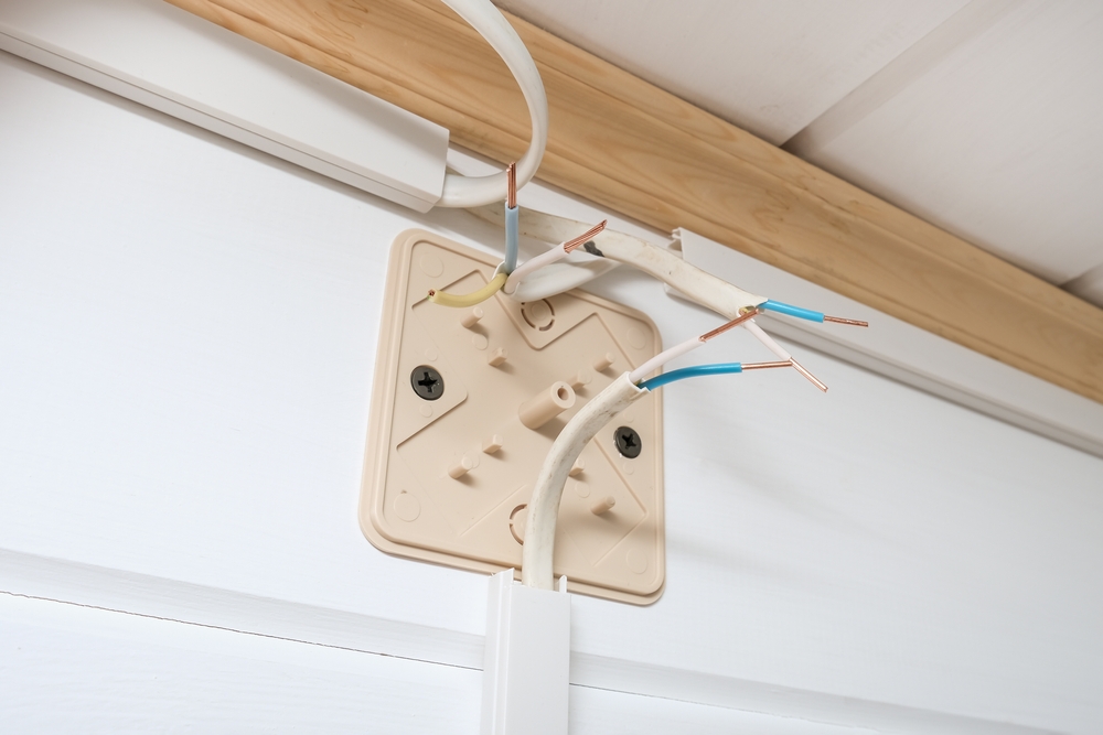 A,Plastic,Fuse,Box,With,Bare,Conductor,,Connecting,Wires,In